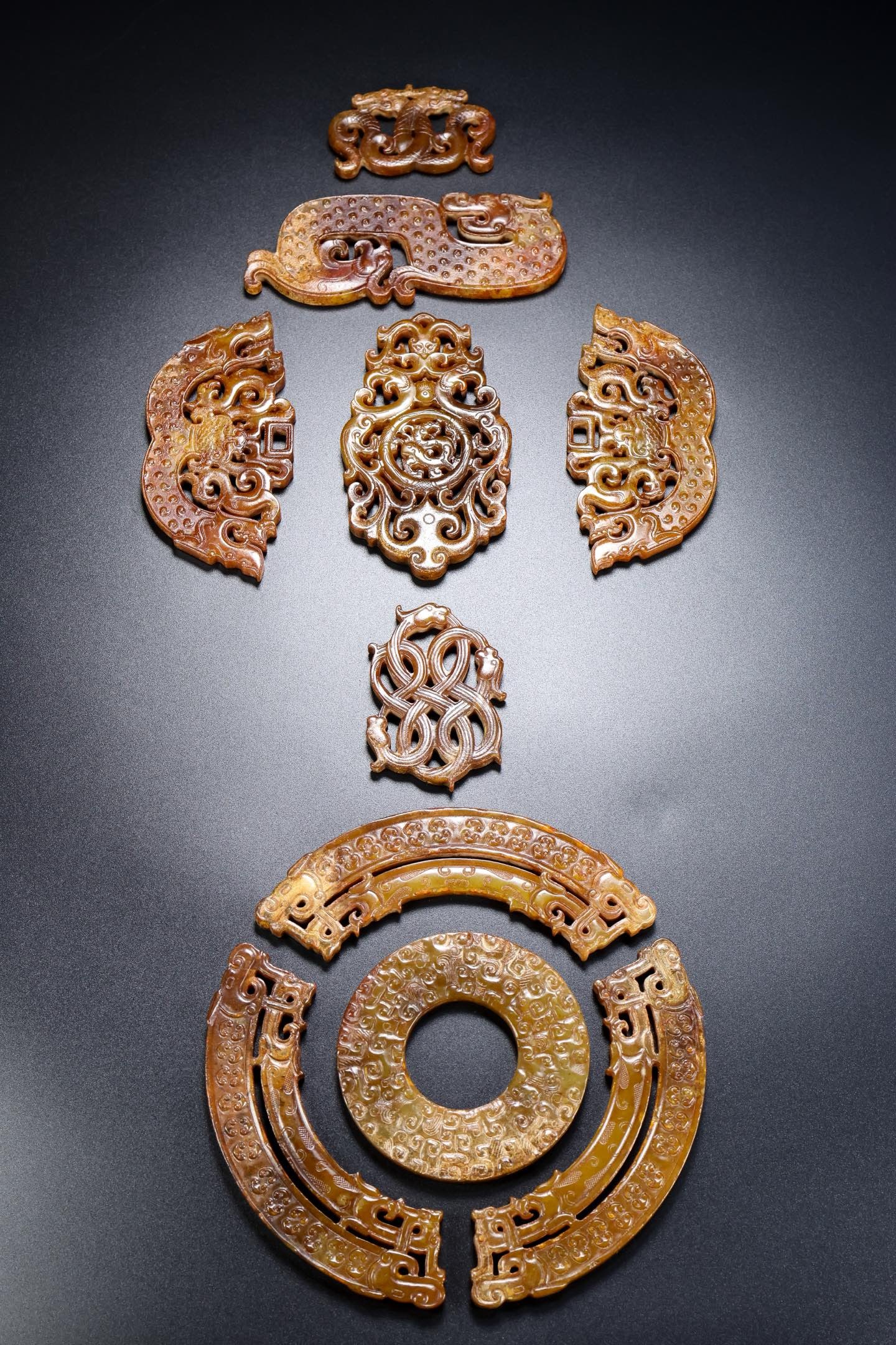 A Set of Exquisite Hotan Jade Bi: A Set of Exquisite Hotan Jade Bi,Han Dynasty, China,Size:19.7inx7.1inx0.2in,Weight:376g 一套和田玉玉璧,中国汉代