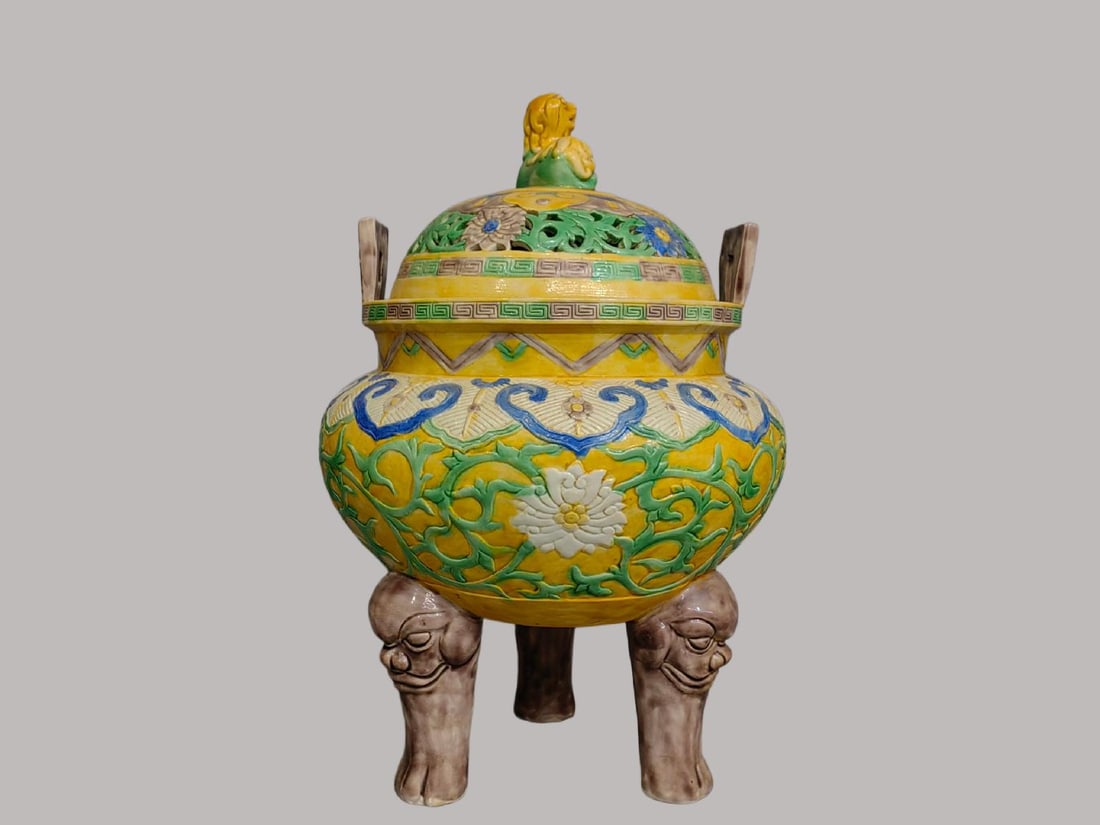 A Exquisite Yellow Ground Famille-Rose Lotus Pattern Tripod Censer: A Exquisite Yellow Ground Famille-Rose Lotus Pattern Tripod Censer,Qing Dynasty, China,Qianlong Six-character Mark,Size:15.7inx8.3inx10.2in