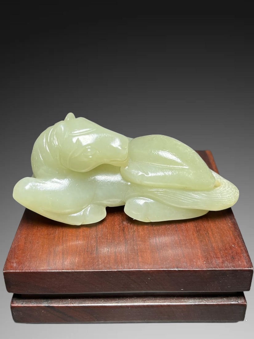 A Exquisite Hotan Jade Horse Handheld Carving: A Exquisite Hotan Jade Horse Handheld Carving,Qing Dynasty, China,Size:3.1inx1.4inx1.5in,Weight:128g 和田玉马手把件,中国清代