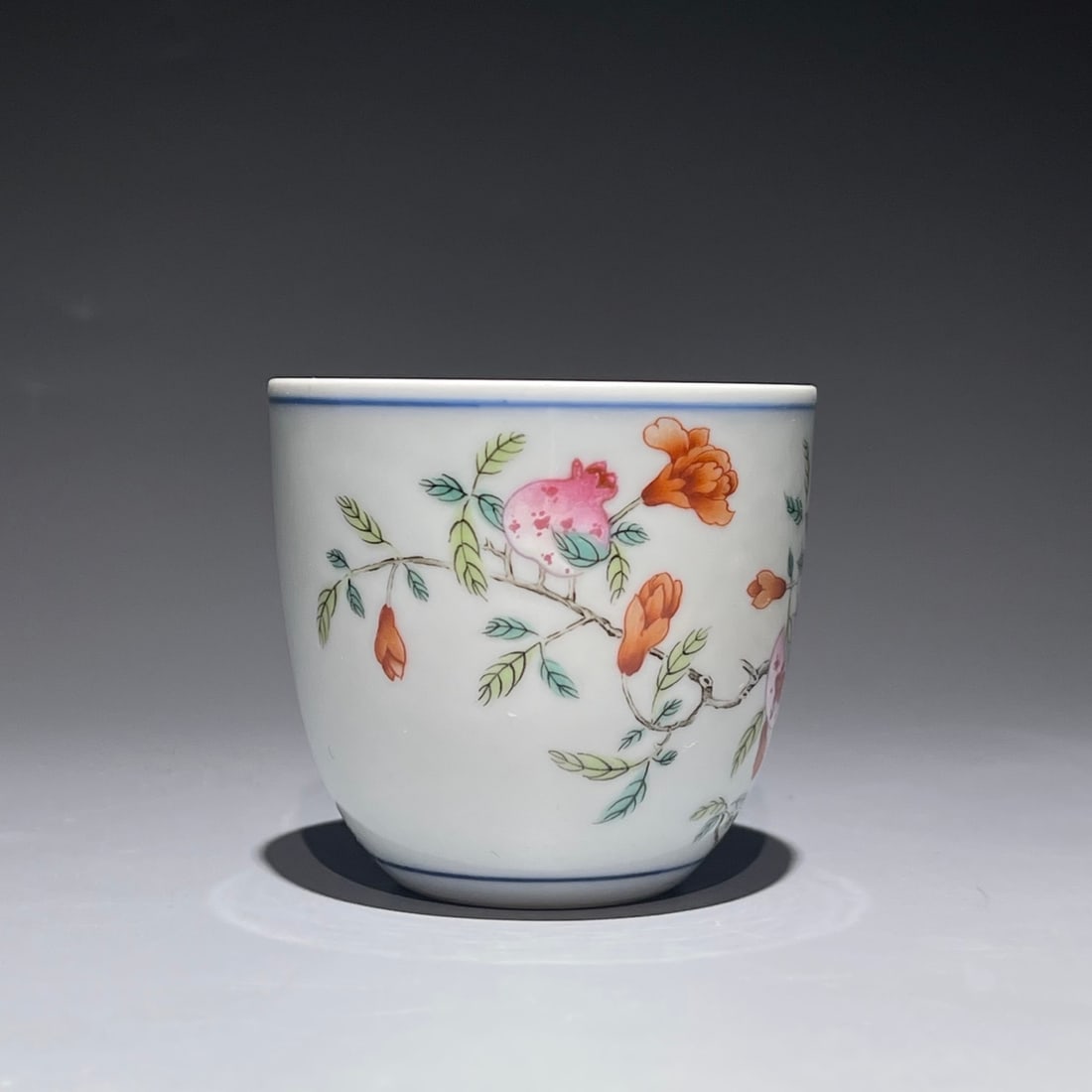 A Exquisite Famille-Rose Painted Gold Figures Pattern Vase: An Exquisite Famille-Rose Pomegranate Pattern Cup,Qing Dynasty, China,Qianlong Six-character Mark,Size:2.4inx2.6in 粉彩石榴纹杯,中国清代,