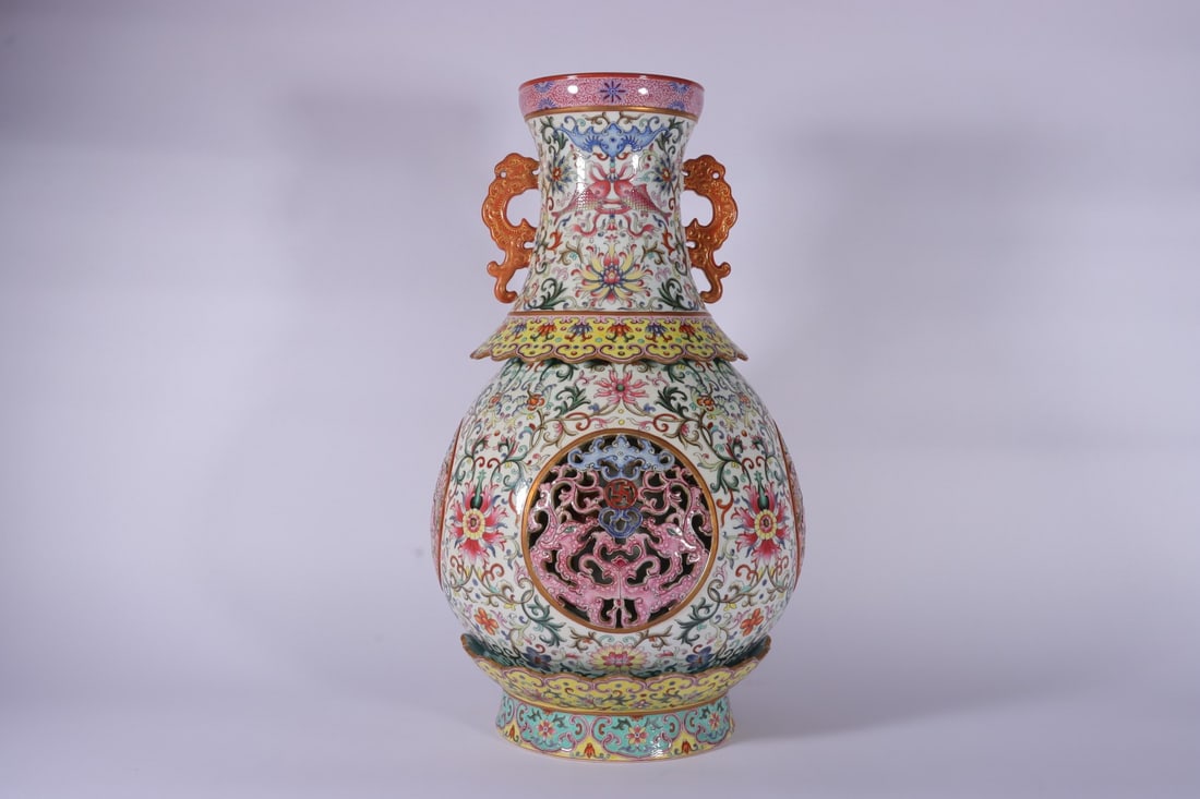 An Exquisite White Ground Lotus Pattern Double-Ears Vase: An Exquisite White Ground Lotus Pattern Double-Ears Vase,Qing Dynasty, China,Qianlong Six-character Mark,Size:19.7inx5.2inx10.2inx7.3in