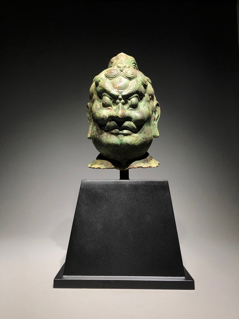 An Exquisite Bronze Buddha Head Ornament (1 of 9)