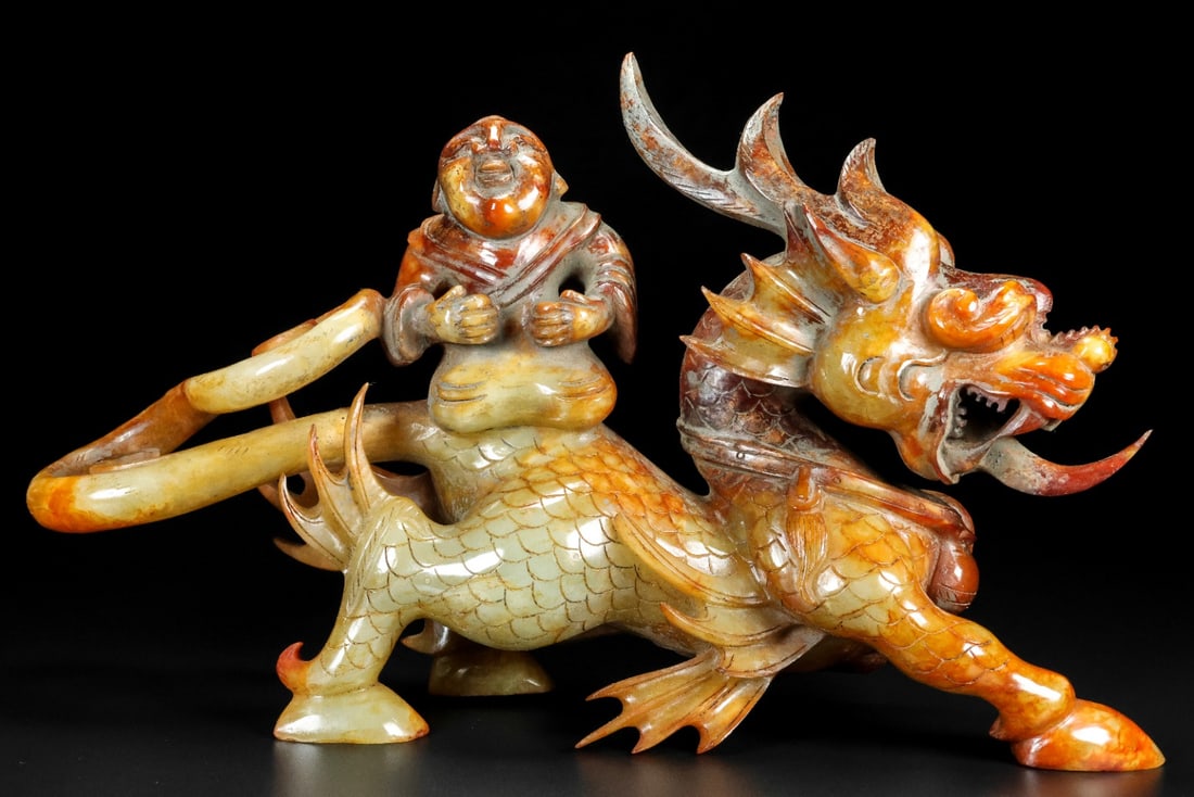 A Exquisite Hotan Jade Auspicious Beast Ornament: A Exquisite Hotan Jade Auspicious Beast Ornament,Han Dynasty, China,Size:12.4inx4.3inx4.7in,Weight:2610g 和田玉瑞兽摆件,中国汉代