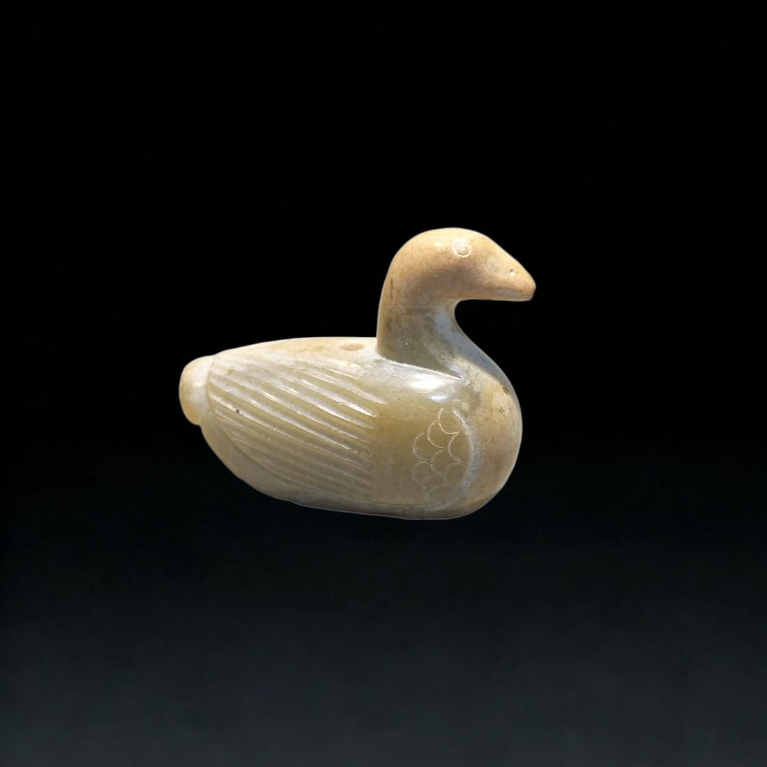 A Exquisite Hotan Jade Phoenix Pendant: A Exquisite Hotan Jade Phoenix Pendant,Han Dynasty, China,Size:2.5inx0.2inx1.1in,Weight:19g 和田玉凤佩,中国汉代