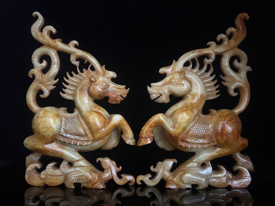 A Pair of Exquisite White Jade Phoenix and Horse Ornaments: A Pair of Exquisite White Jade Phoenix and Horse Ornaments,Qing Dynasty,China, Size:8.7inx5.9inx1.8in,Weight:954g一对白玉凤马摆件,中国଀