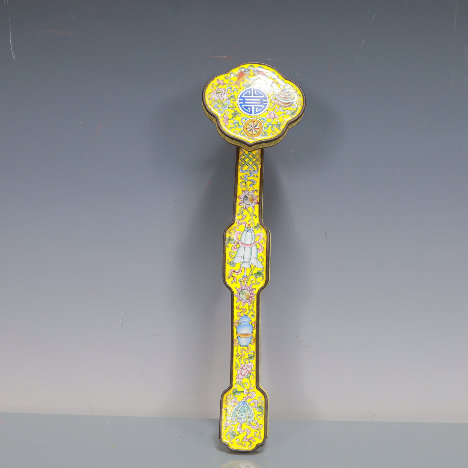 A Exquisite Coppery Enamel Lotus Pattern Ruyi: A Exquisite Coppery Enamel Lotus Pattern Ruyi Qing Dynasty, China Size:3inx11inx2in Weight:300g铜珐琅彩缠枝莲纹如意 中国清