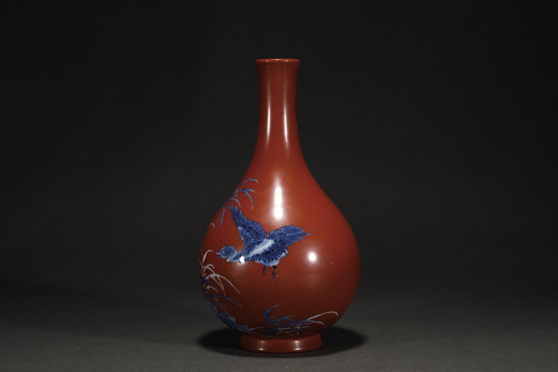 An Exquisite Blue and White Red Glazed Flower and Bird Pattern Vase: An Exquisite Blue and White Red Glazed Flower and Bird Pattern Vase the Republic of China Size:8.1inx4.1in红釉青花鸟瓶 民国 Size:20.5cmx10.5cm