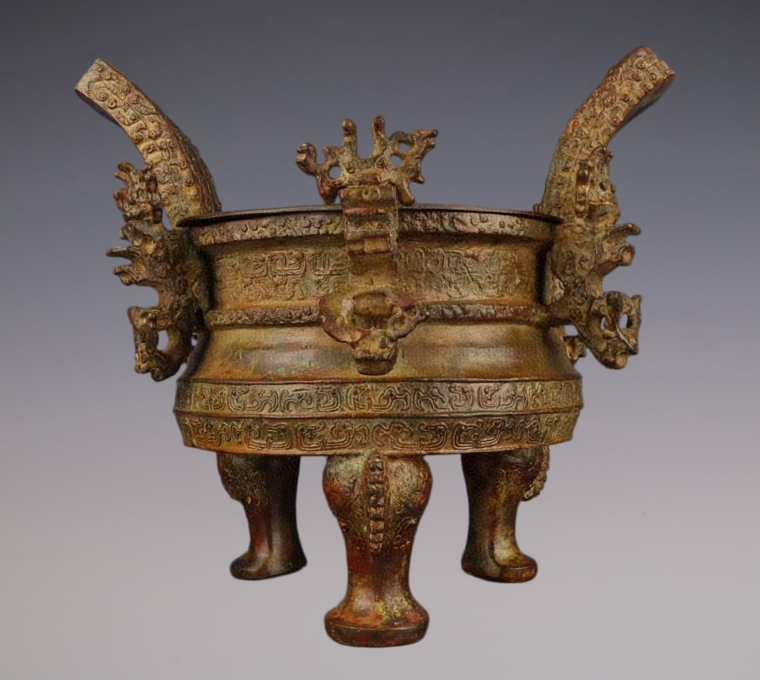 An Archaic Bronze Beast-Ears Tripod Censer,With Inscription: An Archaic Bronze Beast-Ears Tripod Censer,With Inscription,W.Zhou ,China,