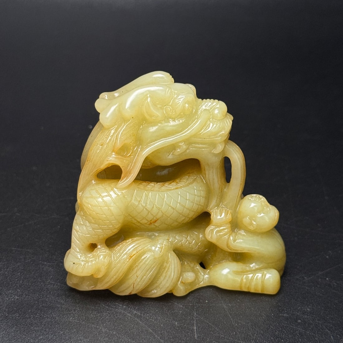 An Exquisite Yellow Jade Auspicious Animal Ornament: An Exquisite Yellow Jade Auspicious Animal Ornament,Qing Dynasty,China,Size:2.4inx2.1inx2.3in,Weight:159g,黄玉瑞兽摆件,中国清代