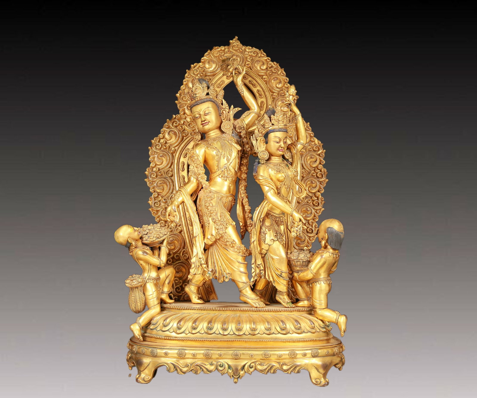 A solemn gilt bronze statue of Bodhisattva: A solemn gilt bronze statue of the Bodhisattva,Yongle six-character mark,Ming Dynasty,China. The Bodhisattva has a graceful and serene posture. His face is A solemn and kind,and his eyes are deep,as i