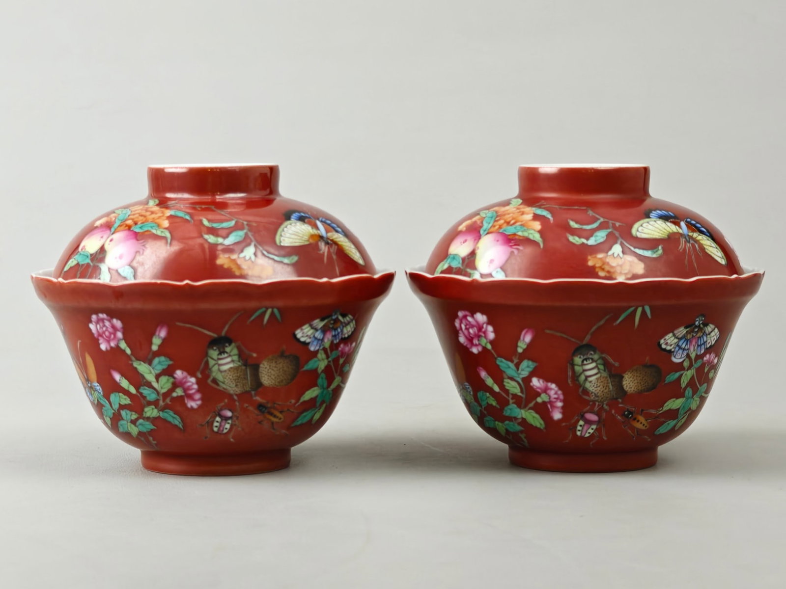 A Pair of Famille-Rose Red Glazed Floral-Insect Pattern Bowl with Cover: A Pair of Famille-Rose Red Glazed Floral-Insect Pattern Bowl with Cover,Qing Dynasty,China,with Yongzheng Six-character Mark,Size:3.7inx4.6in 一对粉彩红釉花&#