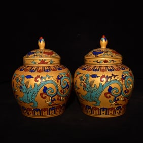 A Pair of Exquisite Gold Ground Wucai Dragon Pattern Lotus Pattern with Cover Jars,