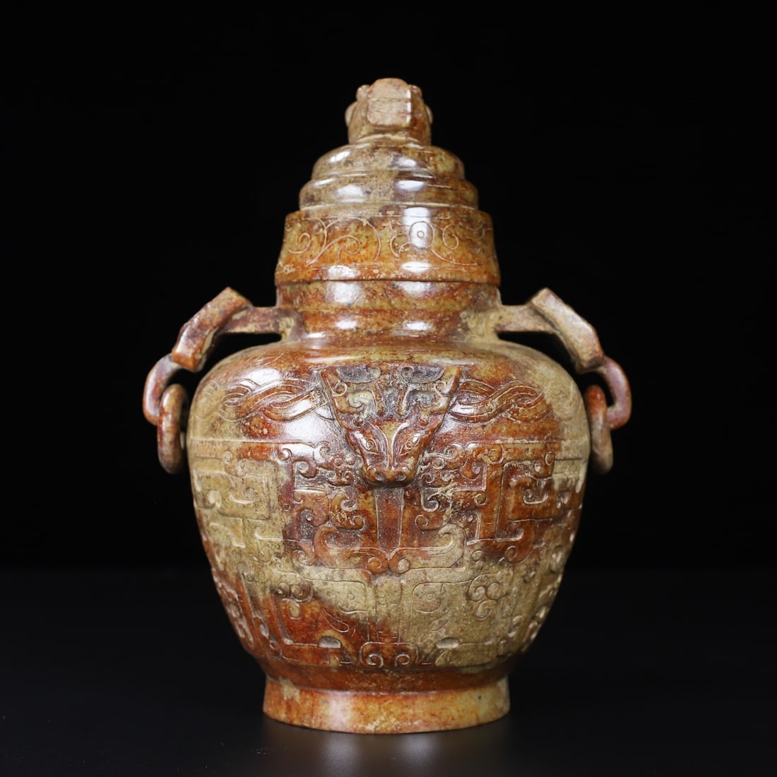 An Exquisite White Jade Beast-Face Pattern with Cover Double-Ears Vase: An Exquisite White Jade Beast-Face Pattern with Cover Double-Ears Vase,Han Dynasty,China,Size:4.8inx6.7in,Weight:2224g,白玉兽面纹带盖双耳瓶,