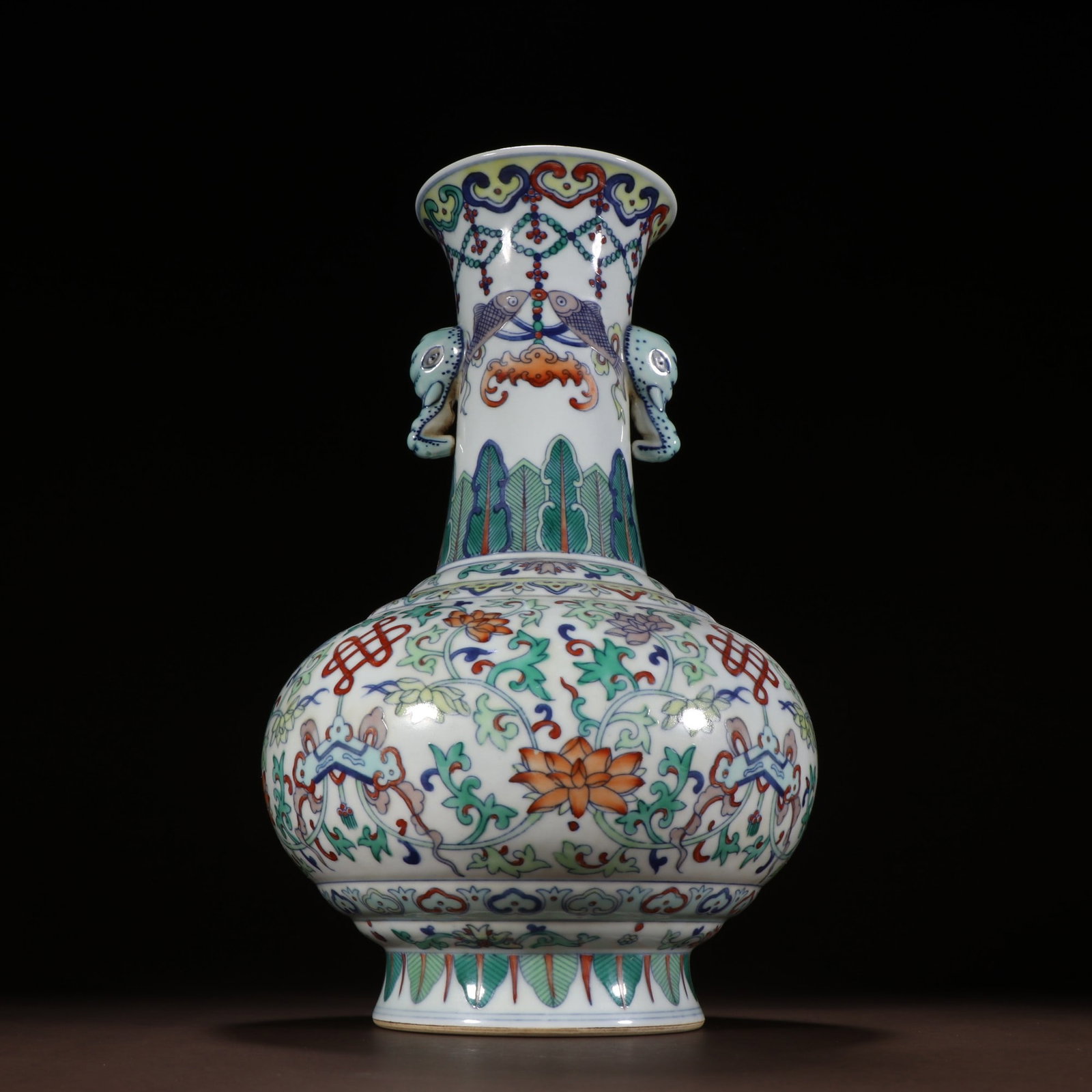 An Exquisite Doucai Lotus Pattern Elephant-Ears Vase: An Exquisite Doucai Lotus Pattern Elephant-Ears Vase,Qing Dynasty,China,with Qianlong Six-character Mark,Size:12.2inx7.5in,斗彩缠枝莲纹象耳瓶,