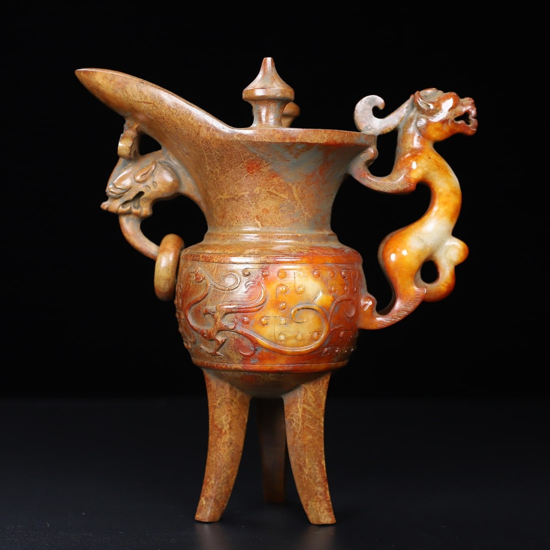 An Exquisite White Jade Dragon Pattern Tripod Goblet (1 of 10)
