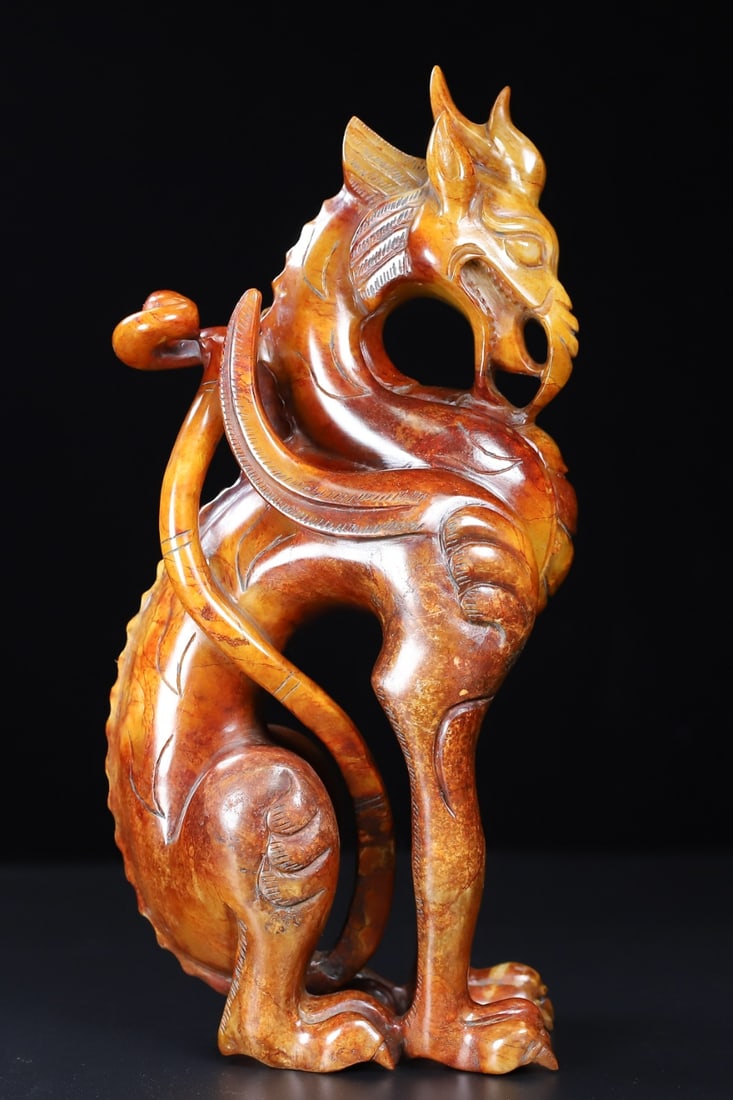 An Exquisite White Jade Auspicious Animal Ornament
