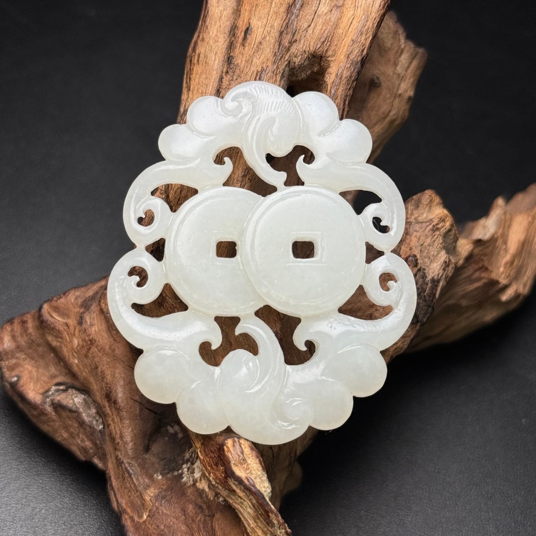 An Exquisite White Jade Cash Pattern Pendant: An Exquisite White Jade Cash Pattern Pendant,Qing Dynasty,China,Size:2.2inx1.9inx0.3in,Weight:26g,白玉铜钱纹挂件,中国清代