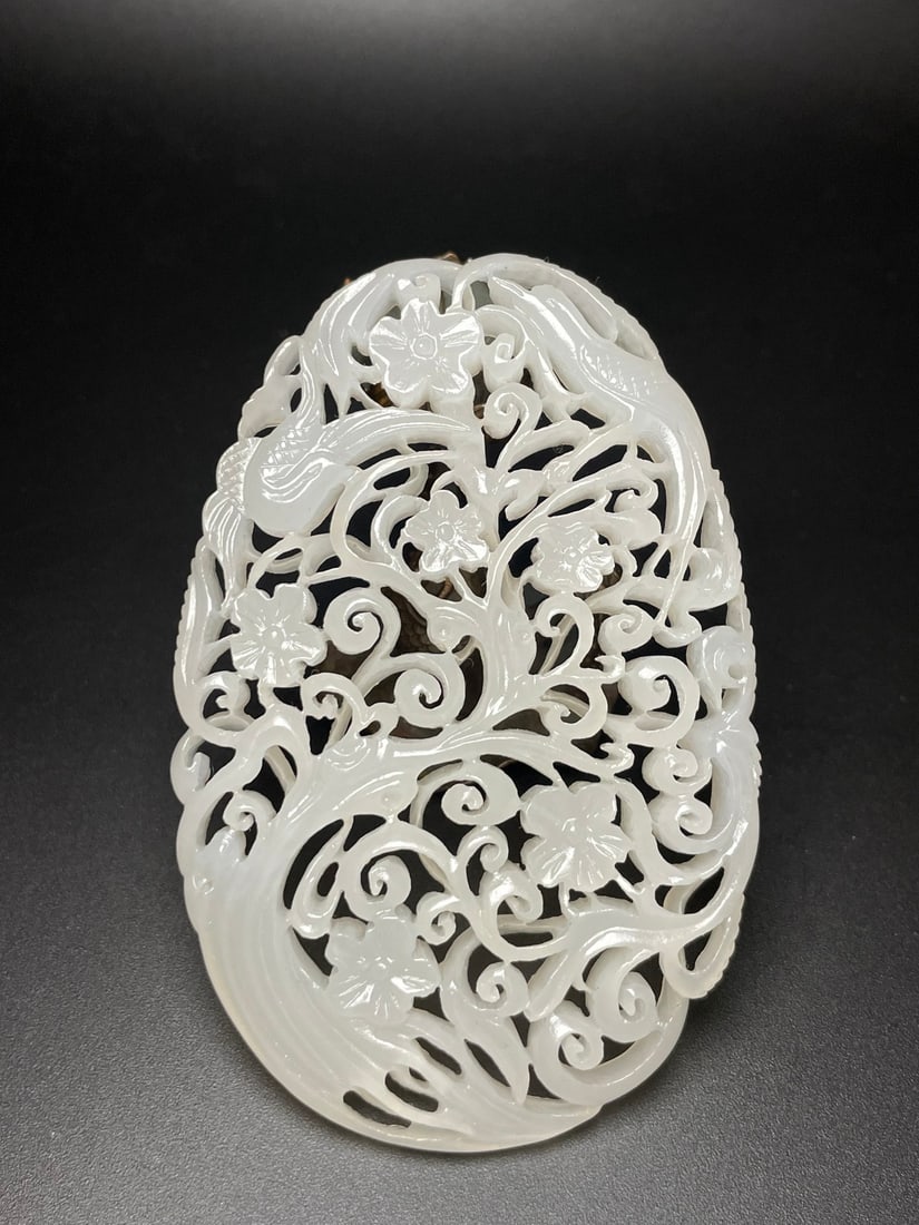 An Exquisite White Jade Flower and Bird Pattern Pendant: An Exquisite White Jade Flower and Bird Pattern Pendant,Qing Dynasty,China,Size:3.9inx2.5inx0.4in,Weight:77g,白玉花鸟纹挂件,中国清代