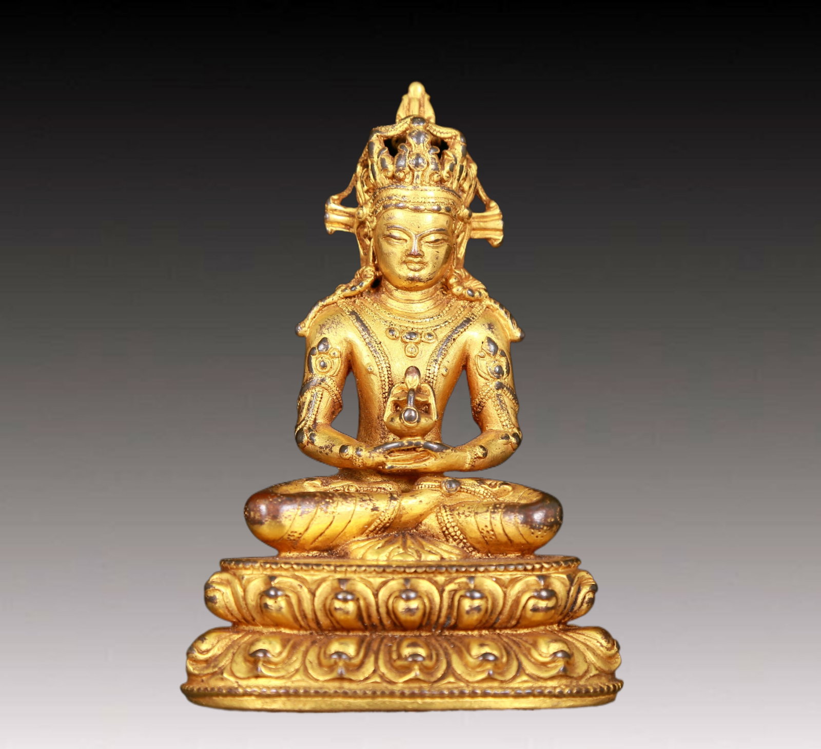 An exquisite gilt bronze statue of Amitayus Buddha