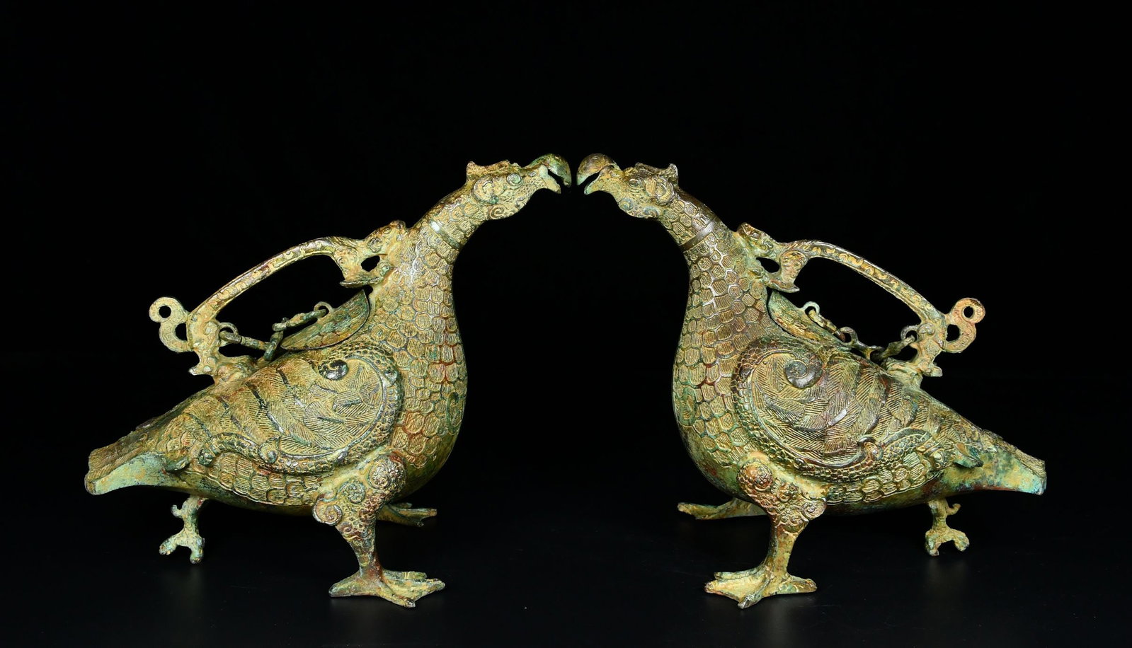 A Pair of Exquisite Bronze Auspicious Animal Ewers (1 of 9)