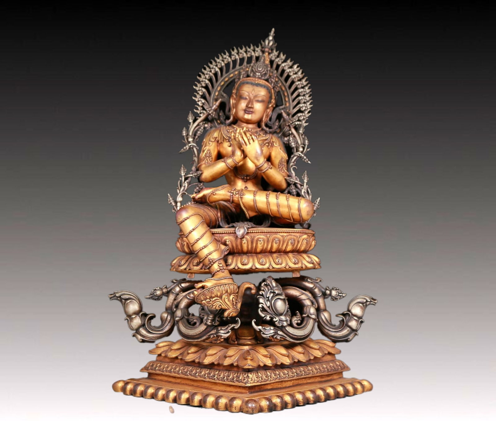 A solemn gilt bronze,silver and green Tara statue (1 of 16)