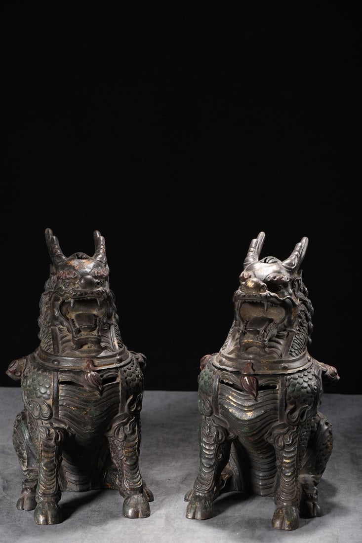 A Pair of Exquisite Gilt Bronze Painted Color Kylin Censers: A Pair of Exquisite Gilt Bronze Painted Color Kylin Censers,Ming Dynasty,China,with Xuande Six-character Mark,Size:11.8inx10.2inx6.3in*2,Weight:7475g,一对铜鎏金彩&#