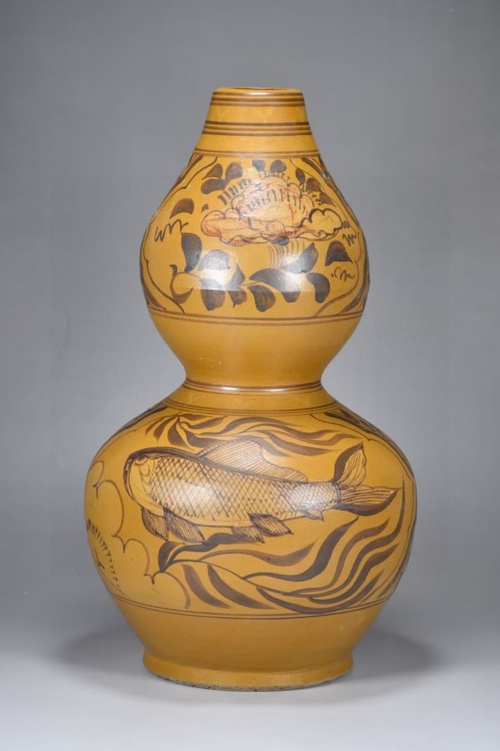An Exquisite Yellow Glazed Jiacai Flower and Bird Pattern Hornwort Pattern Gourd Vase: An Exquisite Yellow Glazed Jiacai Flower and Bird Pattern Hornwort Pattern Gourd Vase,Song Dynasty,China,With Mark,Size:14.2inx7.9in,黄釉加彩花鸟纹鱼