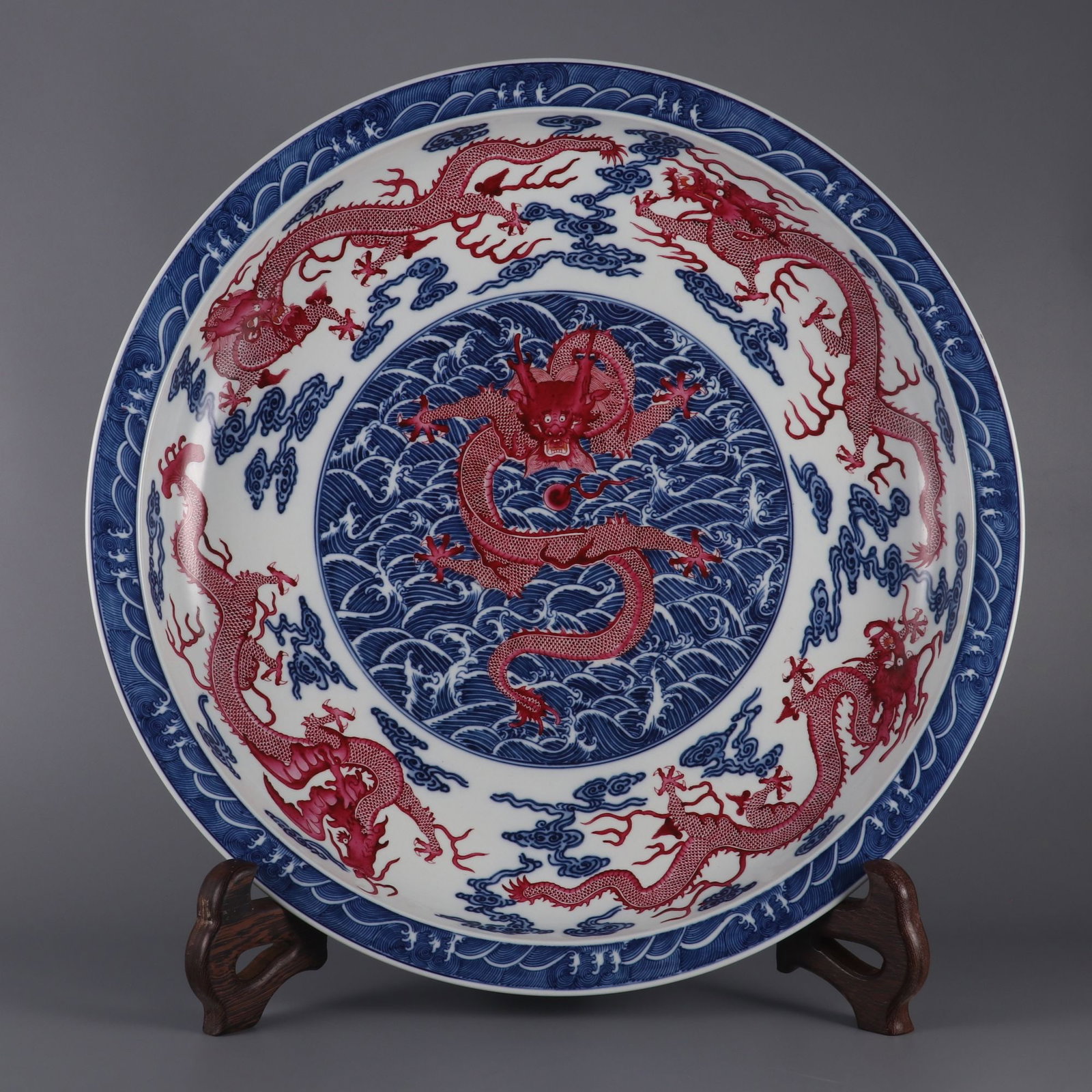 An Exquisite Blue and White Ruby Red-Glazed Seawater Dragon Pattern Plate: An Exquisite Blue and White Ruby Red-Glazed Seawater Dragon Pattern Plate,Qing Dynasty,China,Qianlong Six-character Mark,Size:3.1inx19.5in,青花胭脂红釉海ĕ