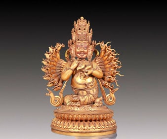A solemn gilt bronze Vajra statue