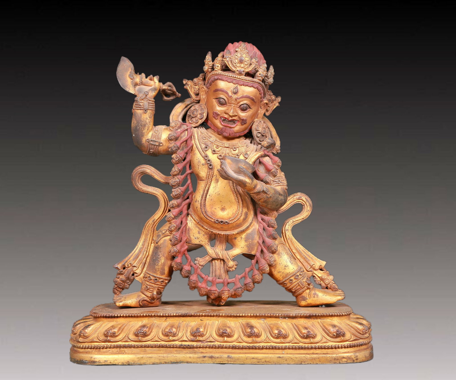 A solemn gilt bronze Vajra statue: A solemn gilt-bronze Vajra statue,Yongle six-character mark,Ming Dynasty,China. Vajra's figure is A solemn and majestic,symbolizing strong will and invincible power. At the same time,his face is A
