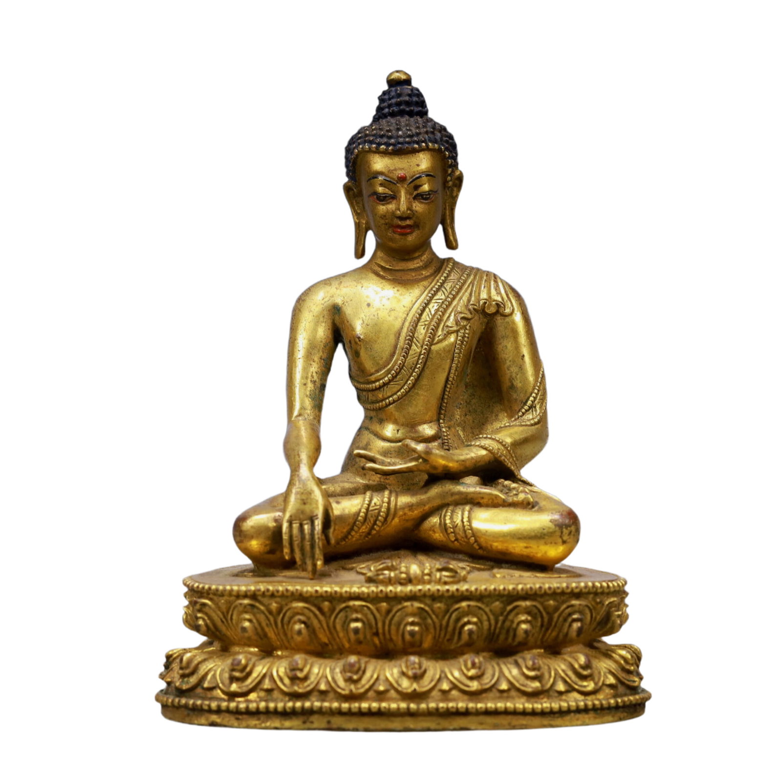 A Solemn Gilt Bronze Statue of Sakyamuni: A Solemn Gilt Bronze Statue of Sakyamuni,Qing Dynasty, China,Size:3.9inx2.8inx5.7inWeight:700g 铜鎏金释迦牟尼像,中国清代