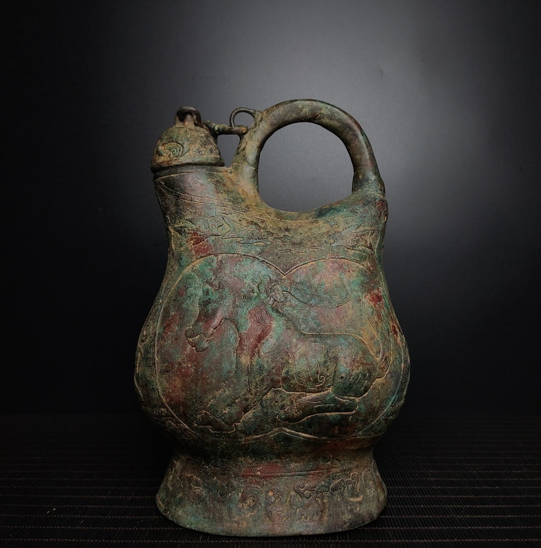 An Exquisite Bronze Horse Pattern Ewer: An Exquisite Bronze Horse Pattern Ewer,the Warring States period in