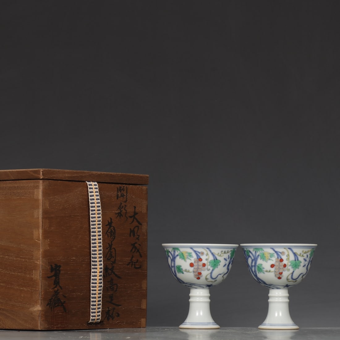 An Exquisite A Pair of Exquisite Doucai Grapes Pattern Stem Cup: An Exquisite A Pair of Exquisite Doucai Grapes Pattern Stem Cup,Ming Dynasty,China,Chenghua Six-character