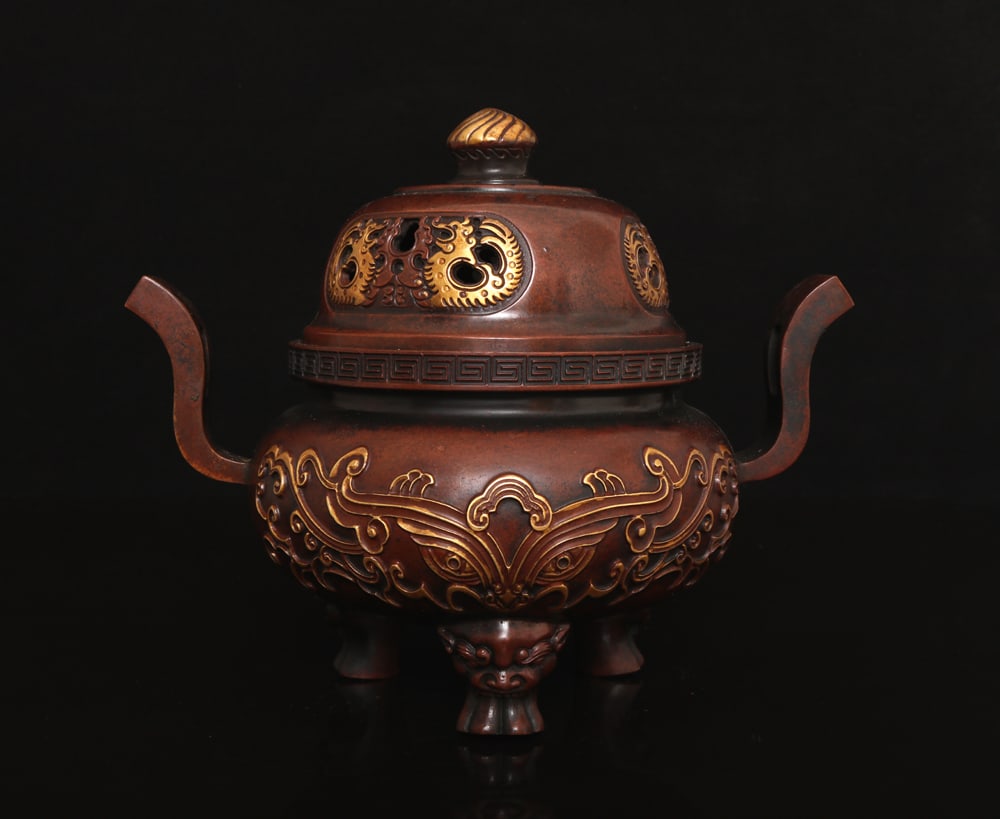 An Exquisite Gilt Bronze Beast-Face Pattern Double-Ears Tripod Censer: An Exquisite Gilt Bronze Beast-Face Pattern Double-Ears Tripod Censer,Ming Dynasty,China,with Xuande Six-character