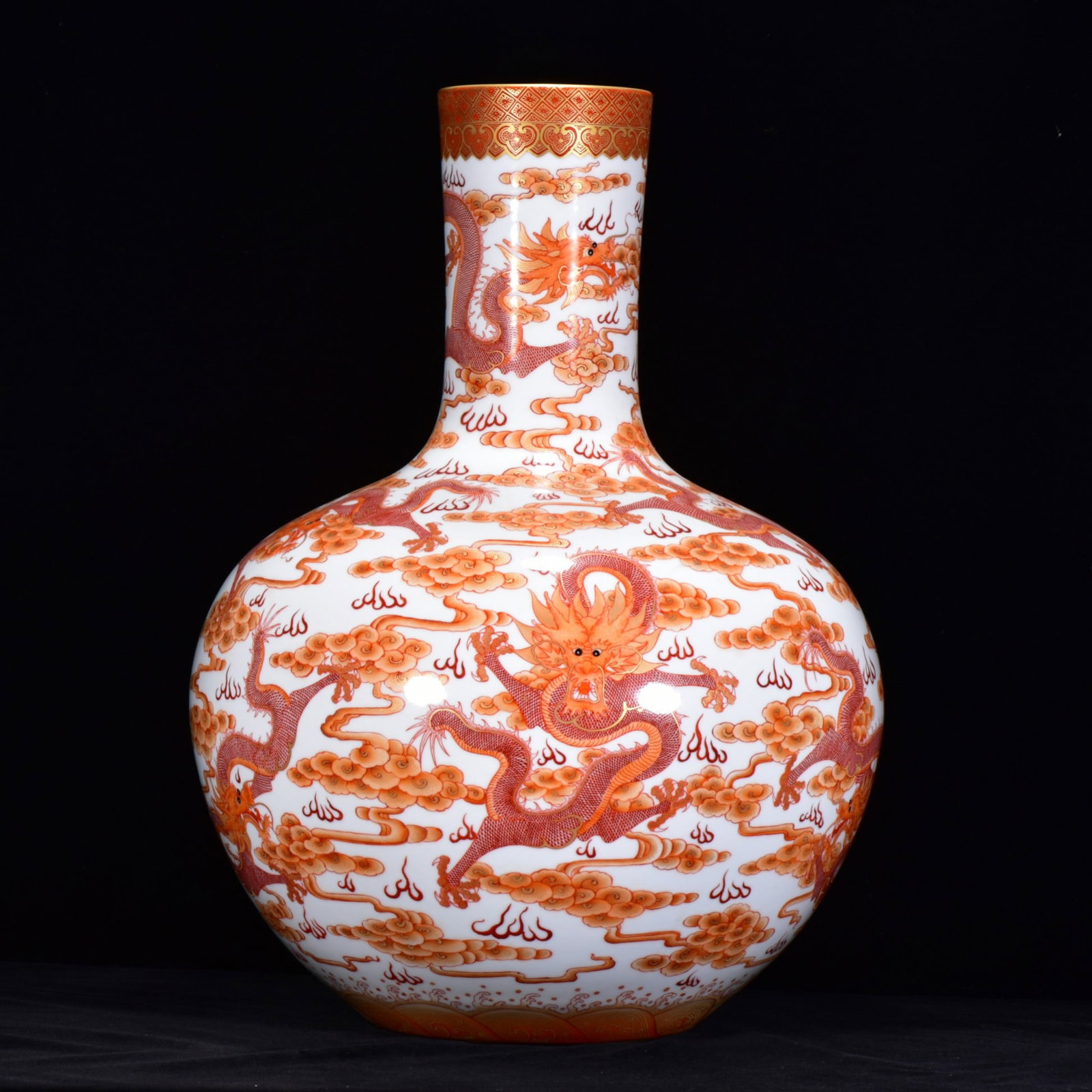 An Exquisite Iron-Red Auspicious Cloud and Dragon Pattern Painted Gold Vase: An Exquisite Iron-Red Auspicious Cloud and Dragon Pattern Painted Gold Vase,Qing Dynasty,China,with Qianlong Four-character Mark,Size:21.7inx14.6in,矾红釉祥云龙 