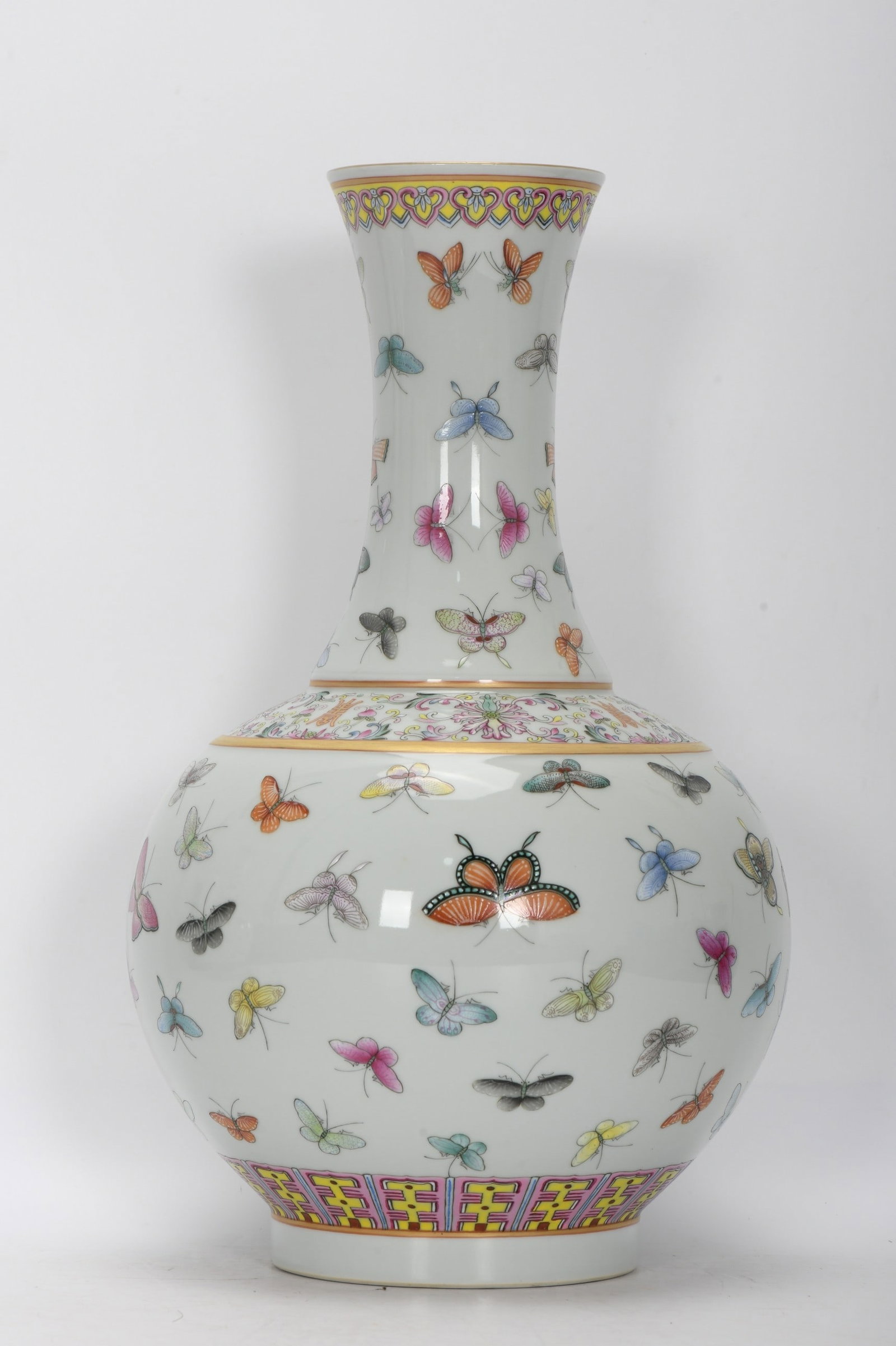 An Exquisite Enamel Flower and Butterfly Pattern Vase: An Exquisite Enamel Flower and Butterfly Pattern Vase,Qing Dynasty, China , Guangxu Six-character Mark,Size:38.cmx9.4in,珐琅彩花卉蝴蝶纹瓶,中