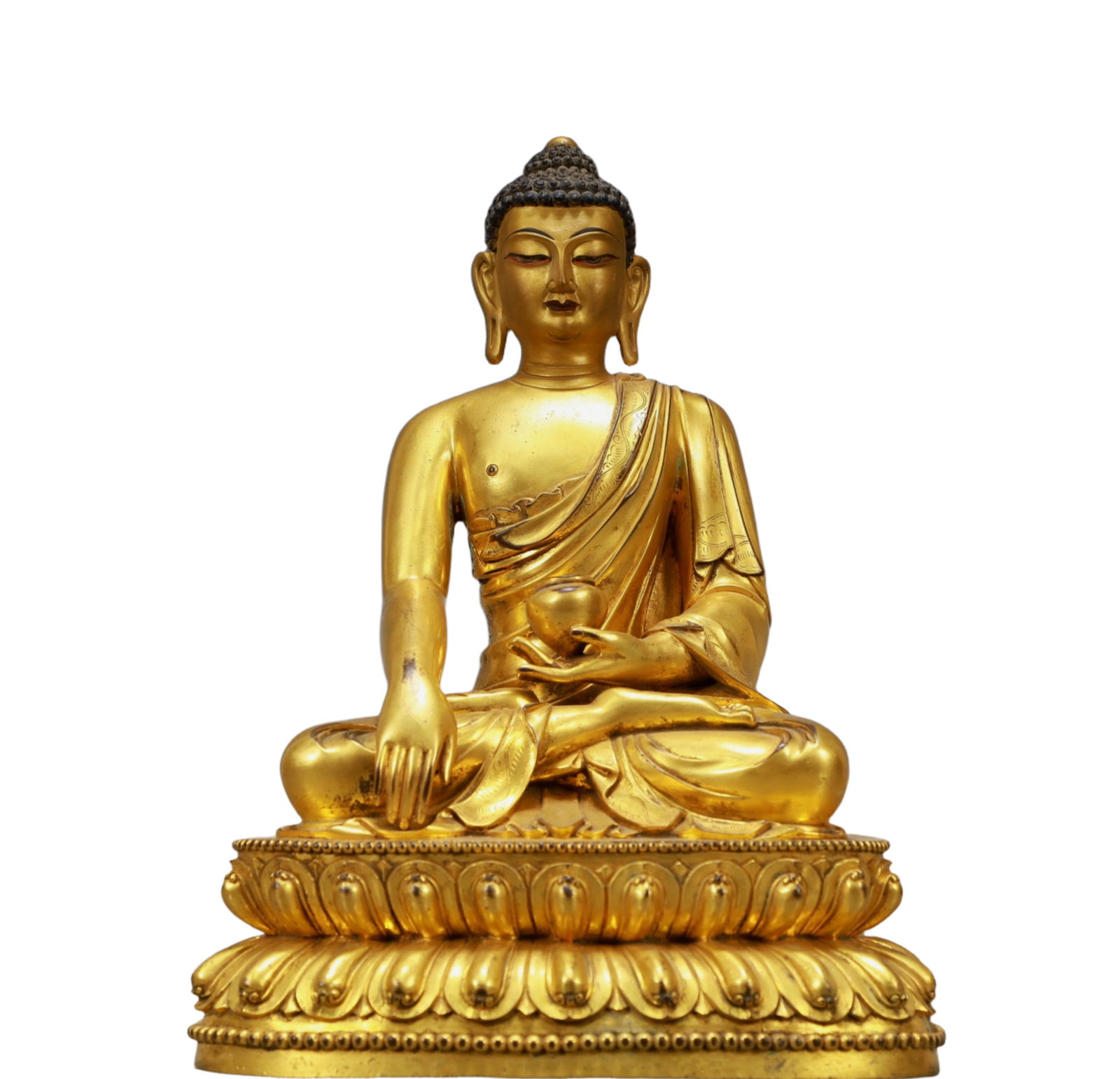 A Solemn Gilt Bronze Statue of Sakyamuni: A Solemn Gilt Bronze Statue of Sakyamuni,Ming Dynasty, China,Size:9.4inx6.3inx13in,Weight:6800g,铜鎏金释迦摩尼像,中国明代