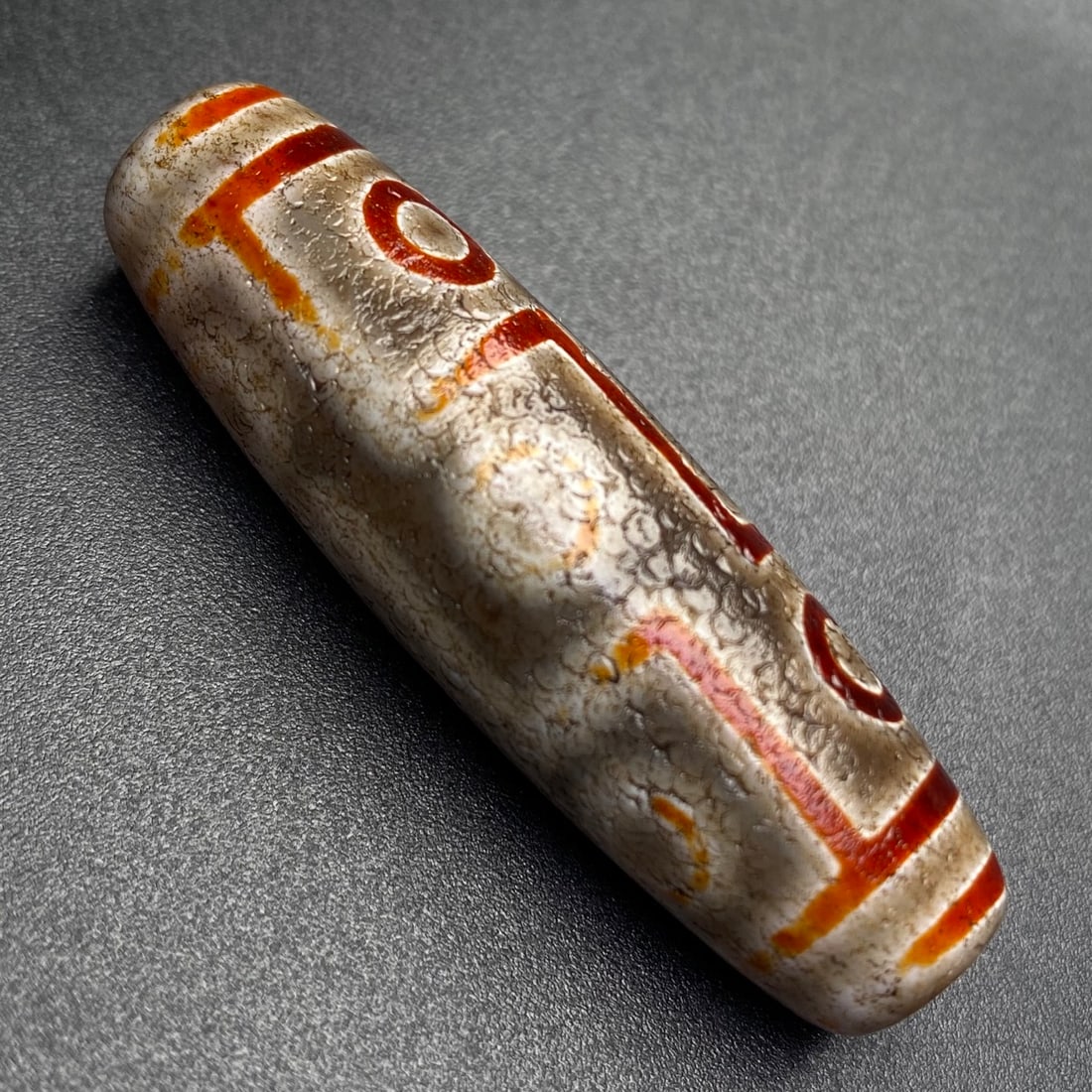 An Exquisite Nine Eyes Dzi Bead Pendant: An Exquisite Nine Eyes Dzi Bead Pendant,Size:49mmx15mm,Weight:16.7g 九眼天珠挂件