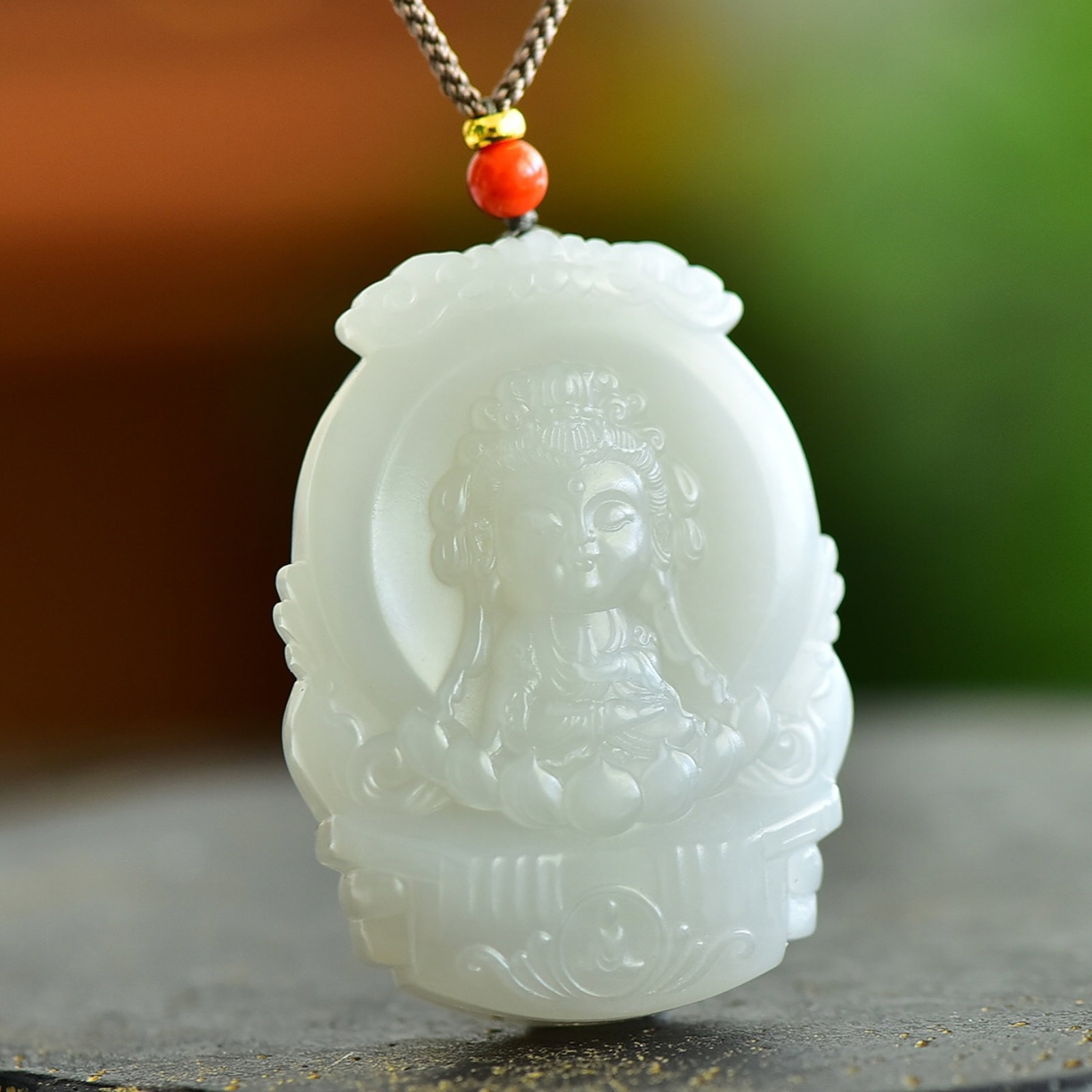 An Exquisite White Jade Buddha Pattern Pendant: An Exquisite White Jade Buddha Pattern Pendant,Size:50mmx38mm 白玉佛像纹吊坠