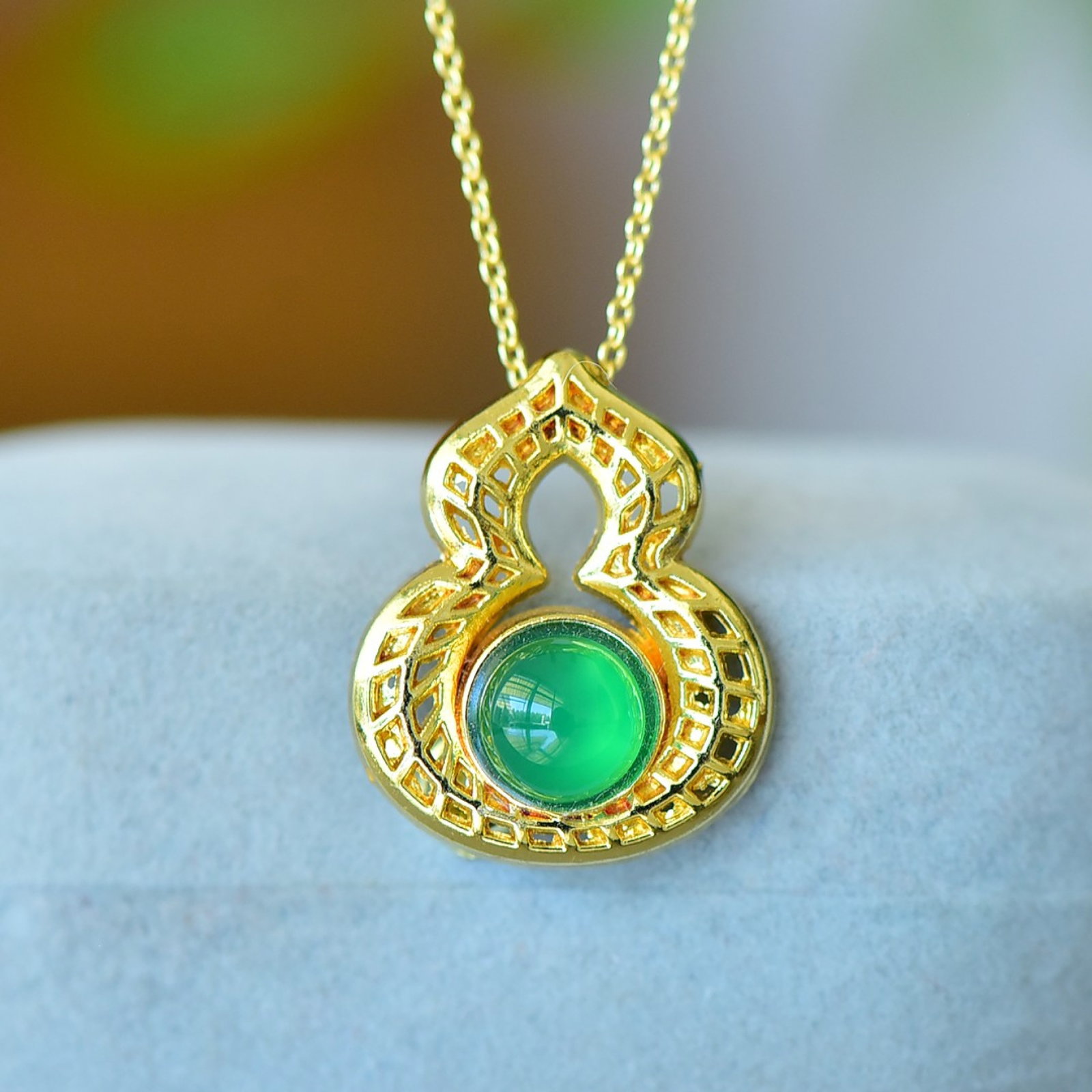An Exquisite Gourd Pendant: An Exquisite Gourd Pendant,Size:8mmx8mm 葫芦吊坠