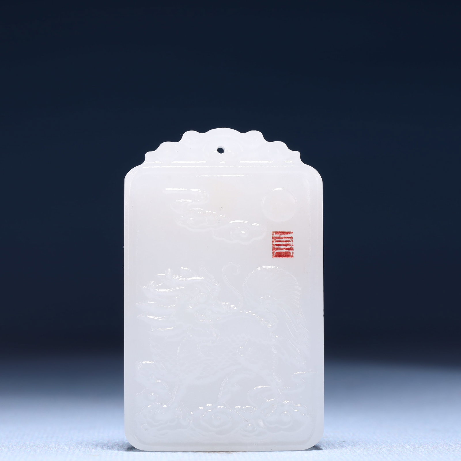 An Exquisite White Jade Kylin Pattern Pendant: An Exquisite White Jade Kylin Pattern Pendant,Size:1.6inx0.4inx2.4in,Weight:54g 白玉麒麟纹牌