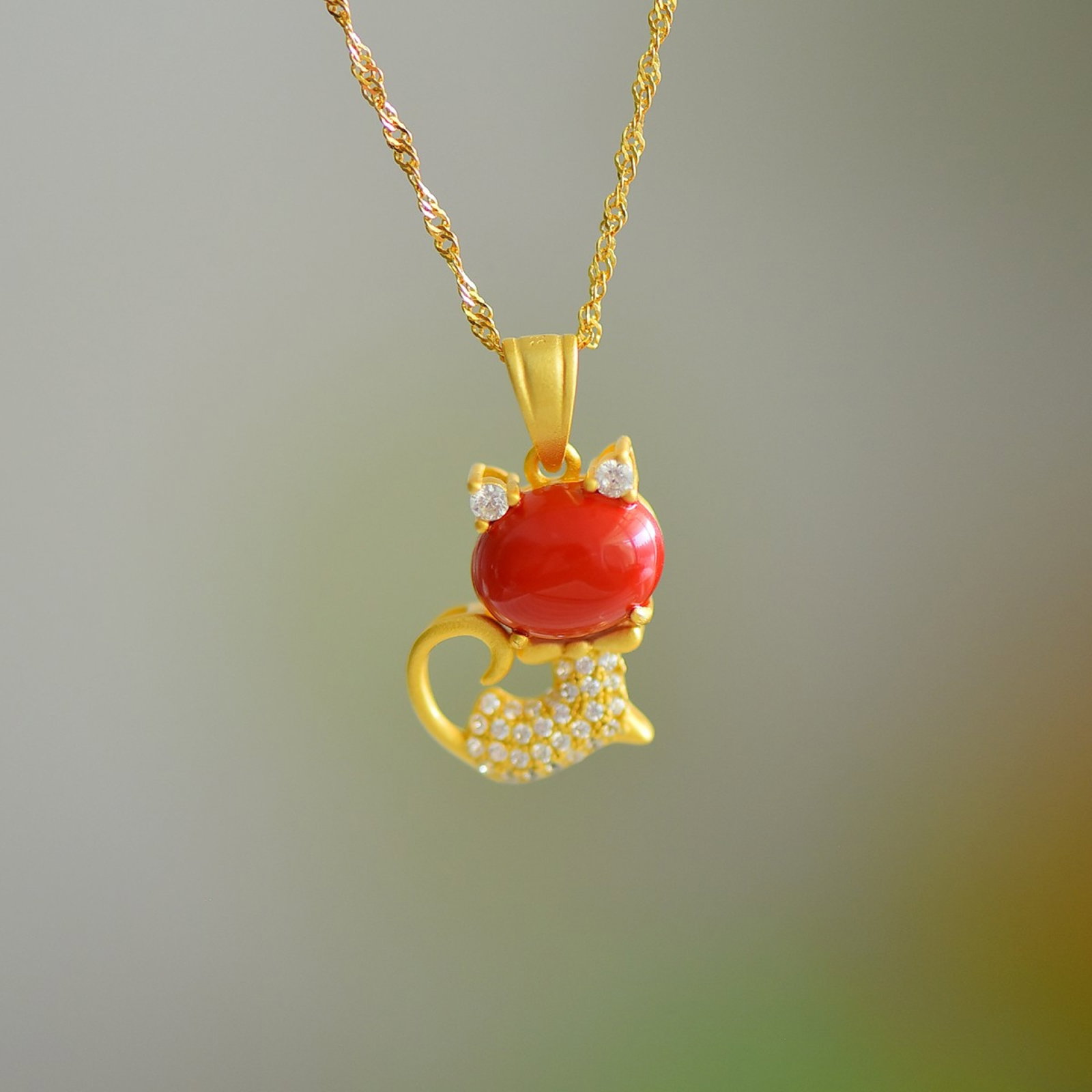 An Exquisite Sterling Silver-Gold Plated Inlaid Cinnabar Pendant,Inlaid Diamond: An Exquisite Sterling Silver-Gold Plated Inlaid Cinnabar Pendant,Inlaid Diamond,Size:8mmx10mm 寓意:招财纳福,守护平安
