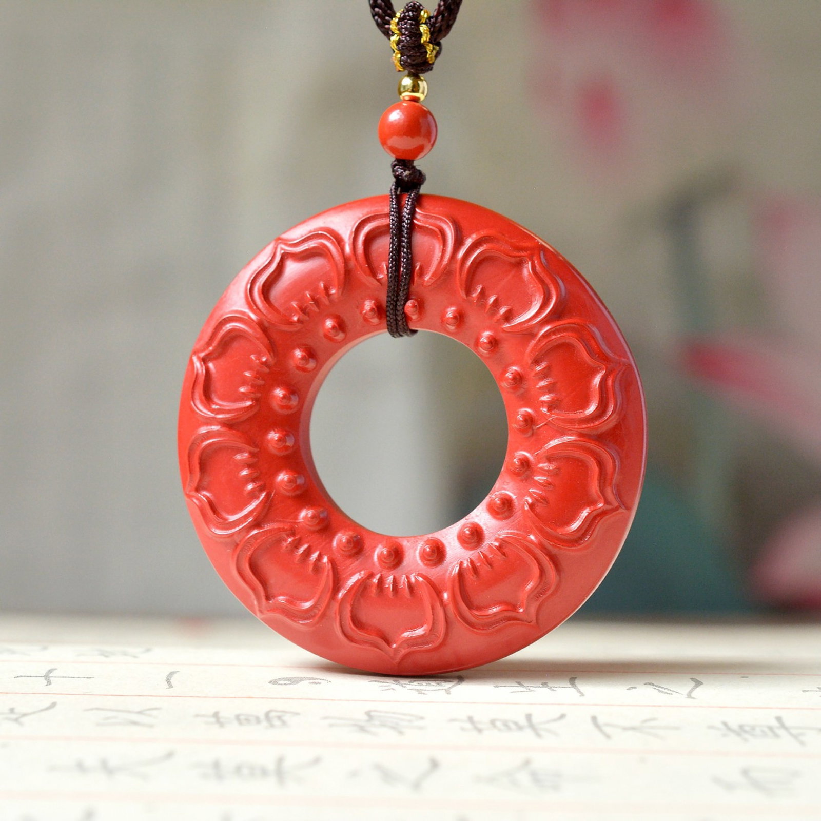 An Exquisite Cinnabar Lotus Pattern Pendant: An Exquisite Cinnabar Lotus Pattern Pendant,Size:48mmx48mm (寓意)吉祥招财喜庆、驱邪避凶