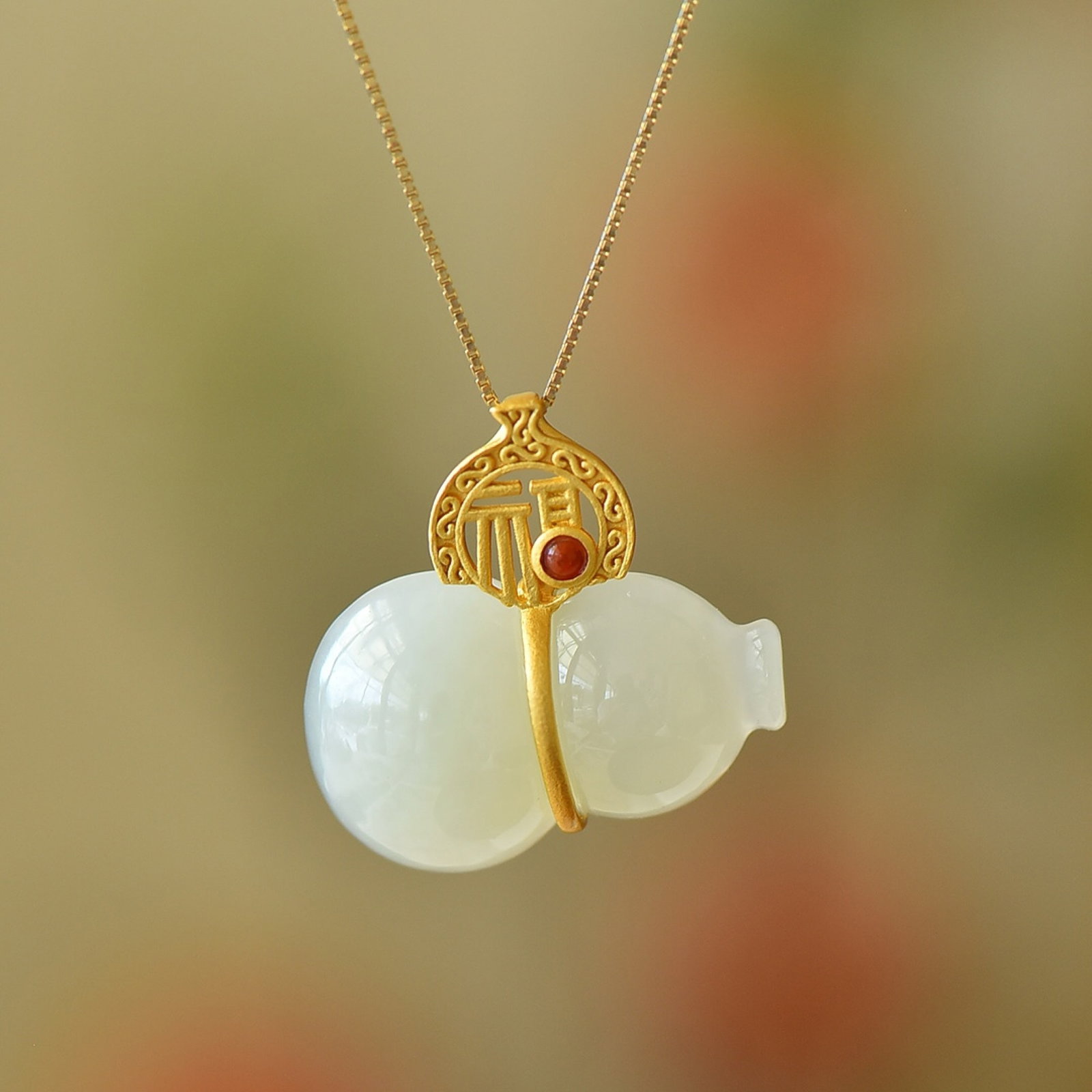 An Exquisite Sterling Silver-Gold Plated Inlaid White Jade Gourd Pendant: An Exquisite Sterling Silver-Gold Plated Inlaid White Jade Gourd Pendant,Size:16mmx25mm 纯银镀金镶白玉葫芦吊坠