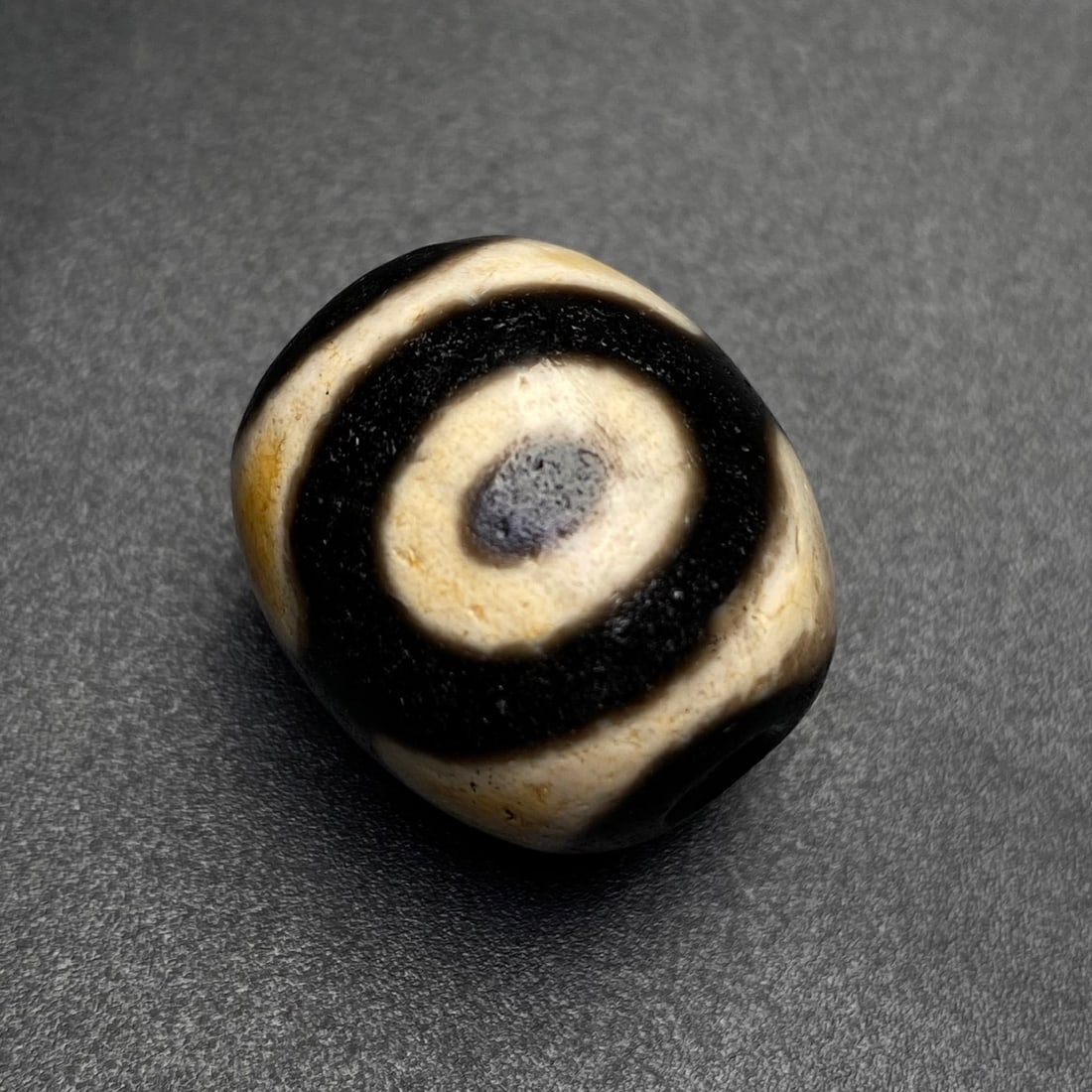 An Exquisite Three Eyes Dzi Bead Pendant: An Exquisite Three Eyes Dzi Bead Pendant,Size:21mmx18mm,Weight:10.6g 三眼天珠挂件