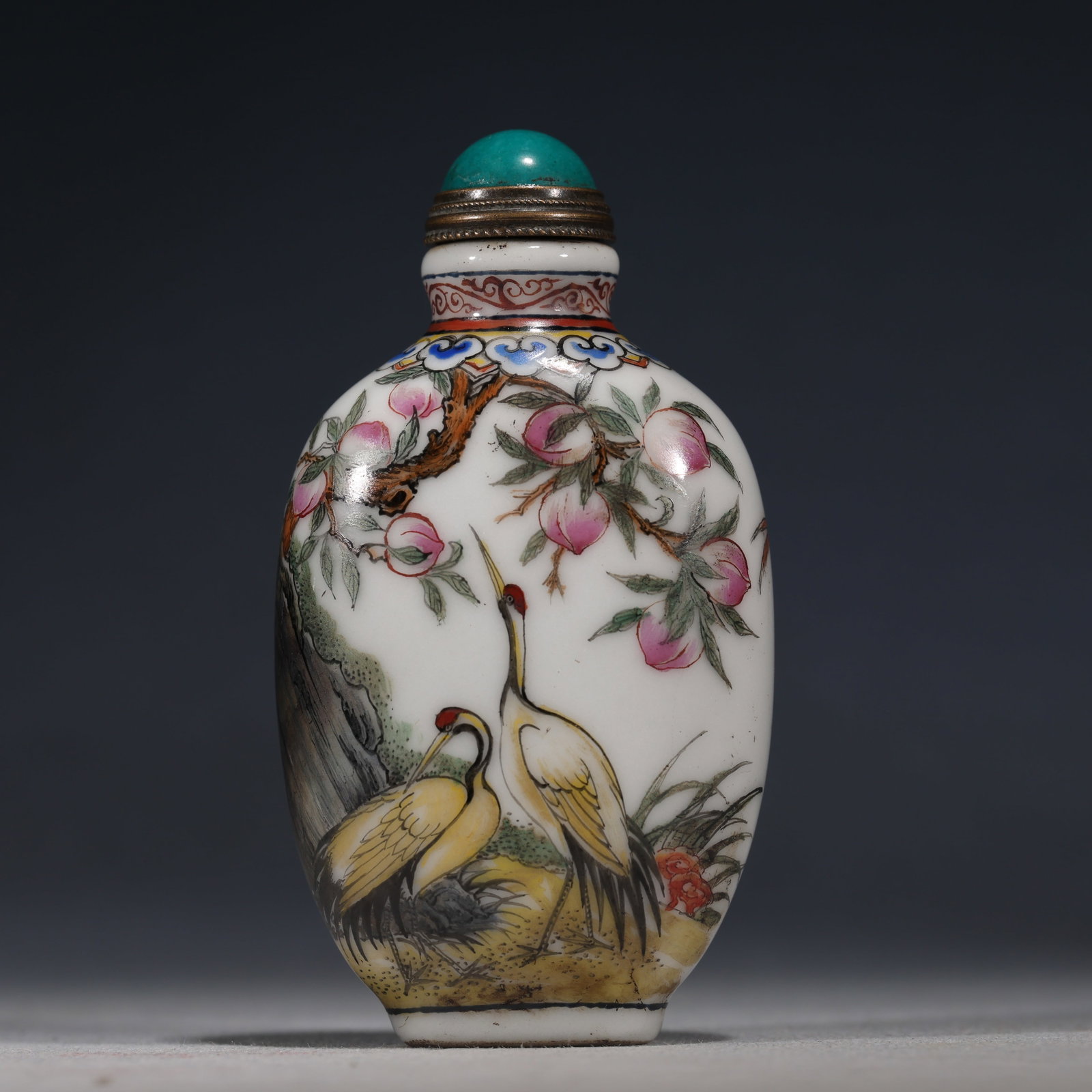 An Exquisite Famille Rose Snuff Bottle With Crane,Longevity And Peach Pattern: An Exquisite Famille Rose Snuff Bottle With Crane,Longevity And Peach Pattern,China,Qing Dynasty,Qianlong Mark,Dimensions:3.1inx1.6in,粉彩鹤寿蟠桃纹鼻&#