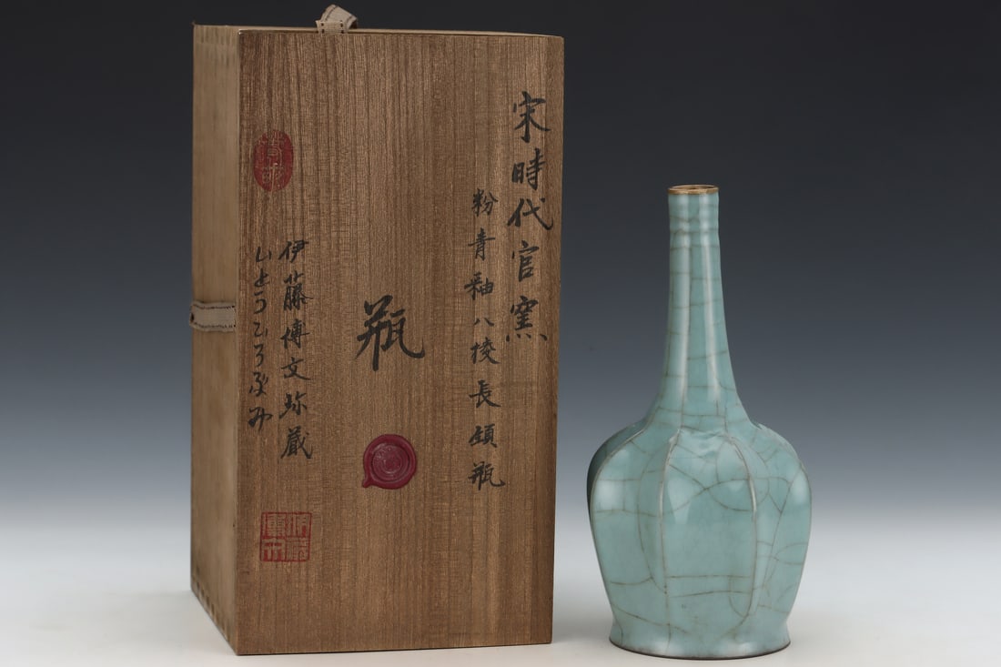 An Exquisite Guan yao Celadon Glazed Vase: An Exquisite Guan yao Celadon Glazed Vase Song Dynasty, China Size:9.3inx4.8in官窑青釉八棱长颈瓶 中国宋代 Size:23.7cmx12.3