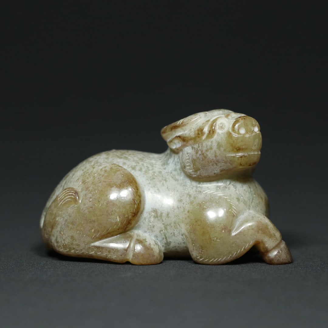 An Exquisite White Jade Buffalo Ornament (1 of 9)