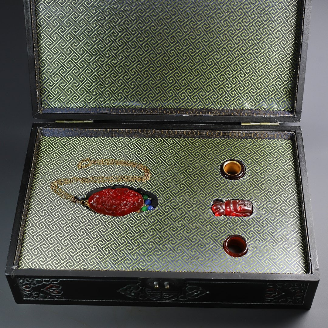 A Set of Fine Gilt Bronze Inlaid Ruby Jewelrys: A Set of Fine Gilt Bronze Inlaid Ruby Jewelrys,Qing Dynasty,China,Qianlong Four-character Mark,Size:(Box)15.7inx10.2inx4.7in,(Jadeite)17.3inx2in,(Ring)1.2inx1.2in,(Avalokitesvara)2.4inx1.2in,Total