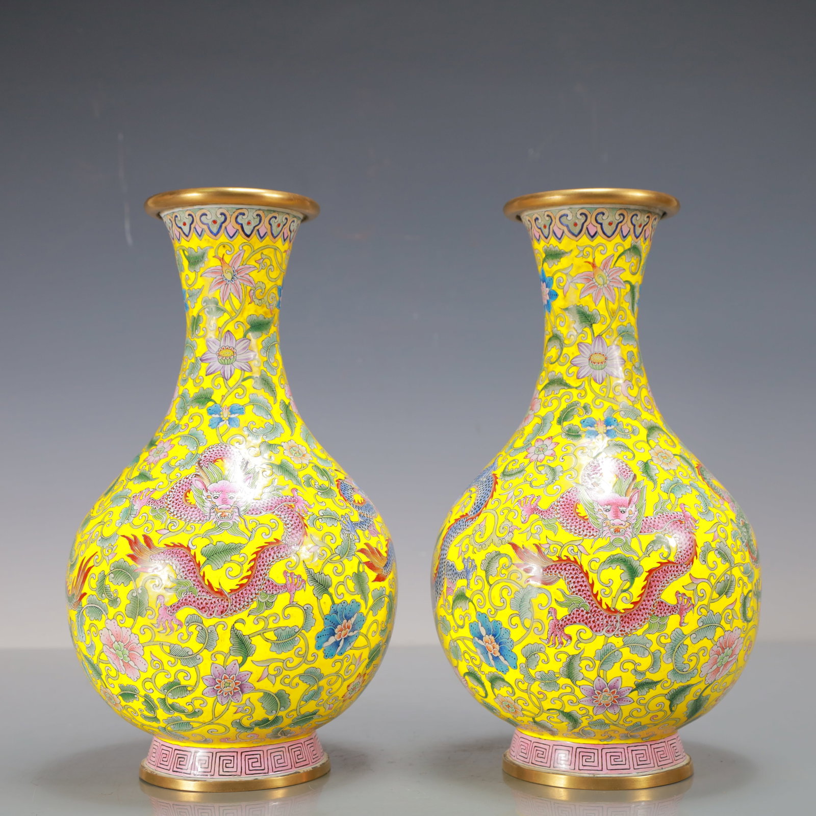 A Exquisite A pair of Coppery Enamel Lotus Pattern Dragon Pattern Vase: A Exquisite A pair of Coppery Enamel Lotus Pattern Dragon Pattern Vase Qing Dynasty, China Qianlong Four-character Mark Size:5.5inx9.8in Weight:1750g一对铜珐琅彩
